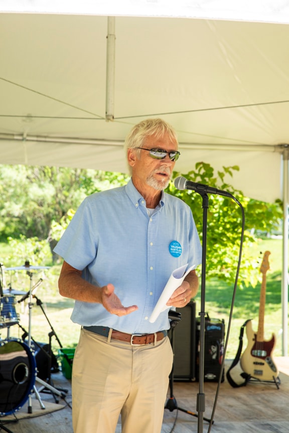 Vaughn Goettler speaking at the microphone at his campaign kickoff event