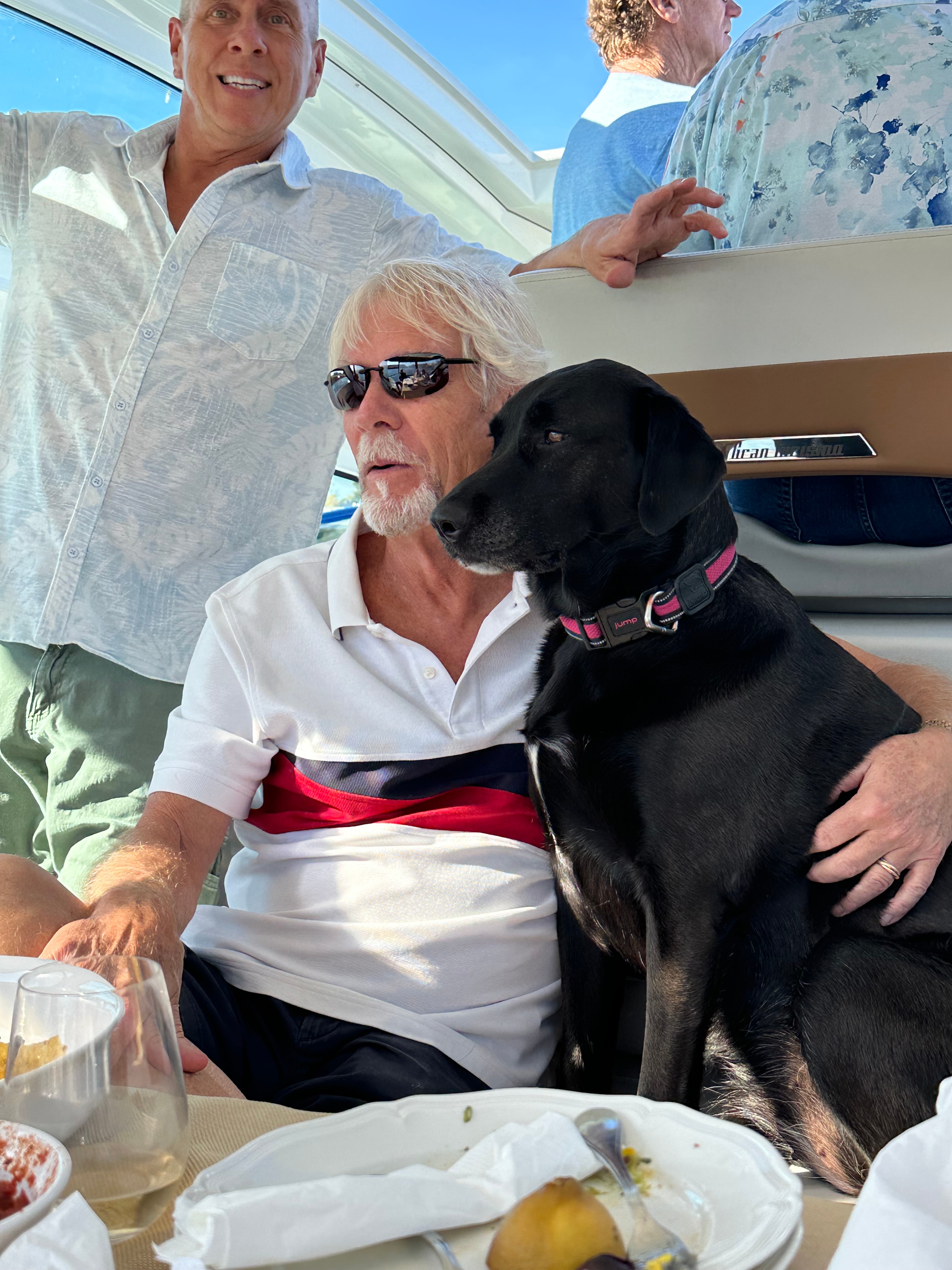 Vaughn meeting a supporter and their dog on the campaign trail
